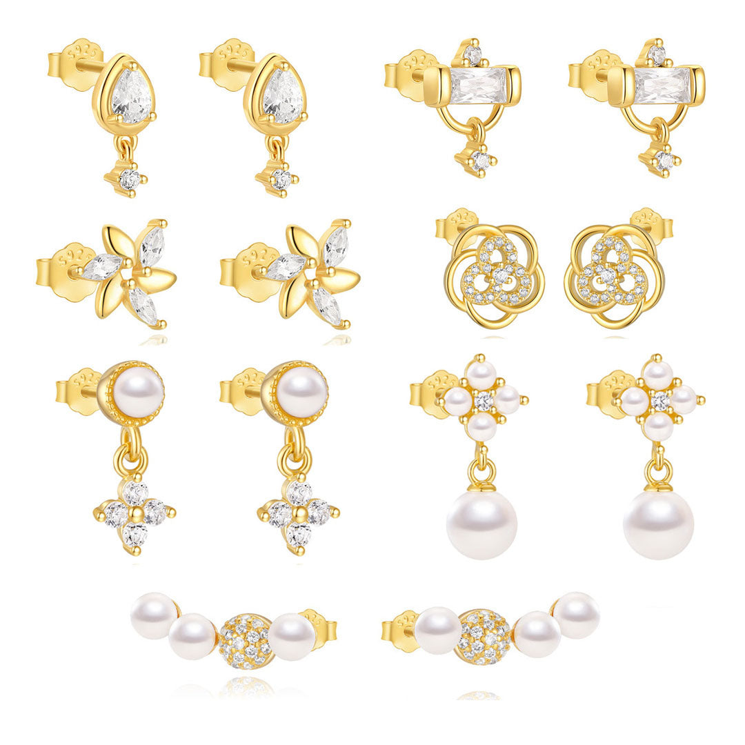 Viktorie – Jemné zlaté náušnice s delikátním třpytem.