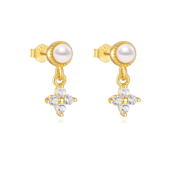 Viktorie – Jemné zlaté náušnice s delikátním třpytem.