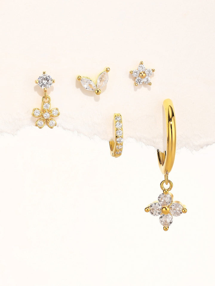 Nora – Jemné zlaté náušnice s jasnou formou.