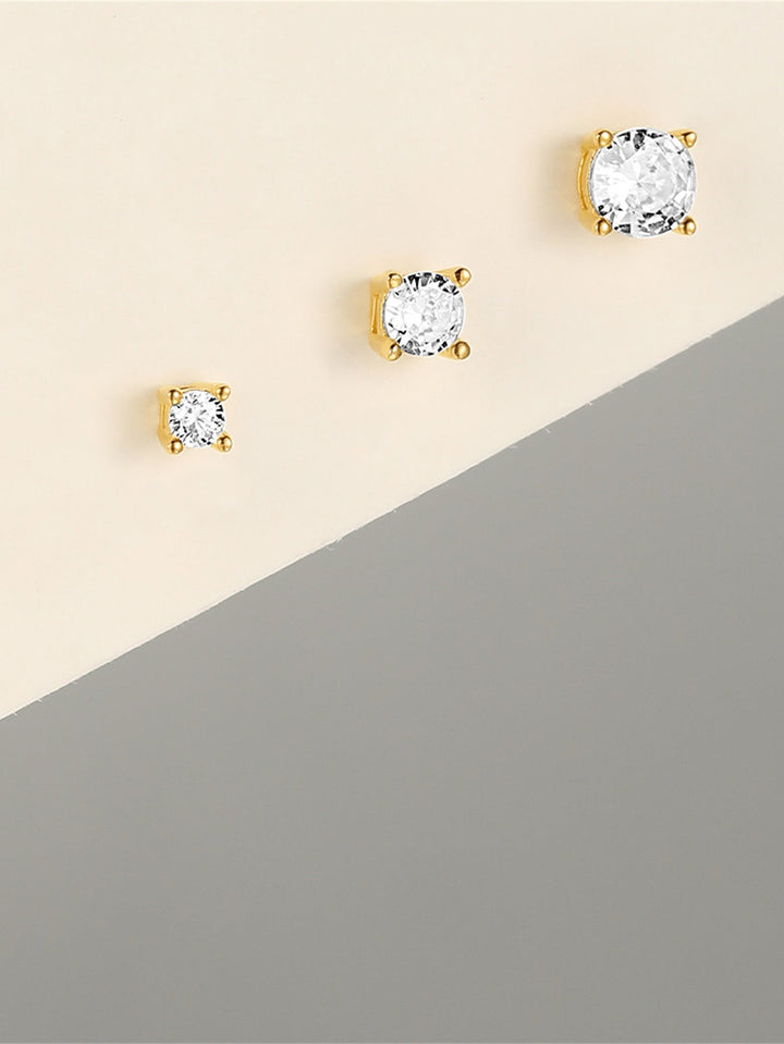 Evelína – Jemné zlaté náušnice s elegantním zakřivením.