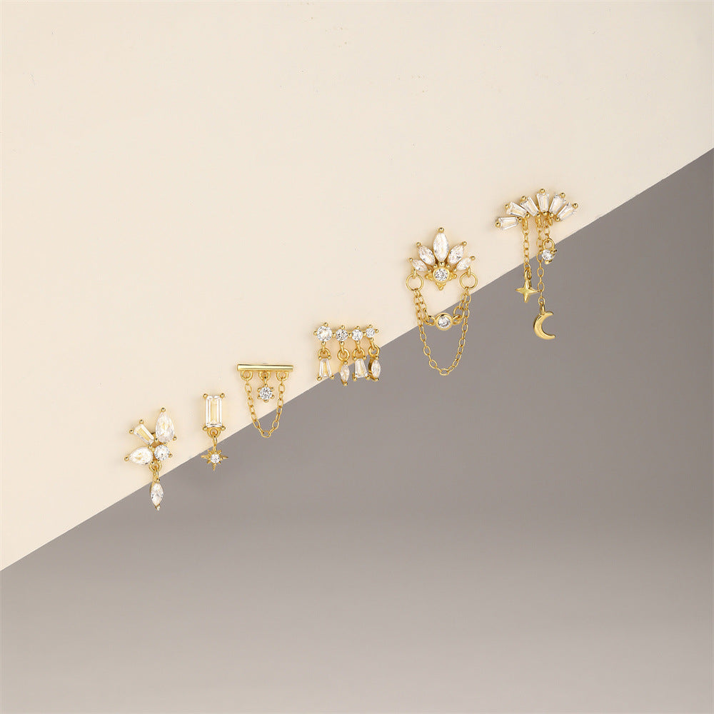 Miriam – Zlaté náušnice s jasnou strukturou.