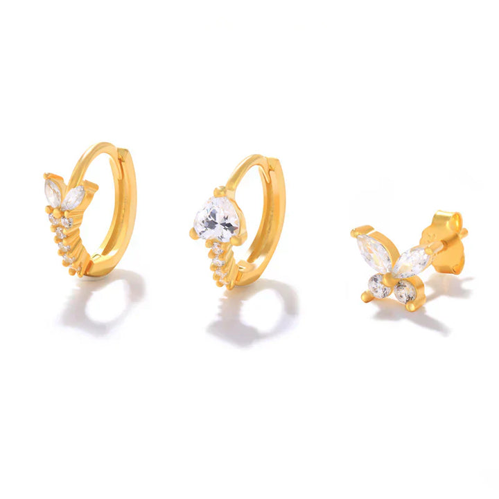 Eva-Marie – Jemné zlaté náušnice s plynulým tvarem.