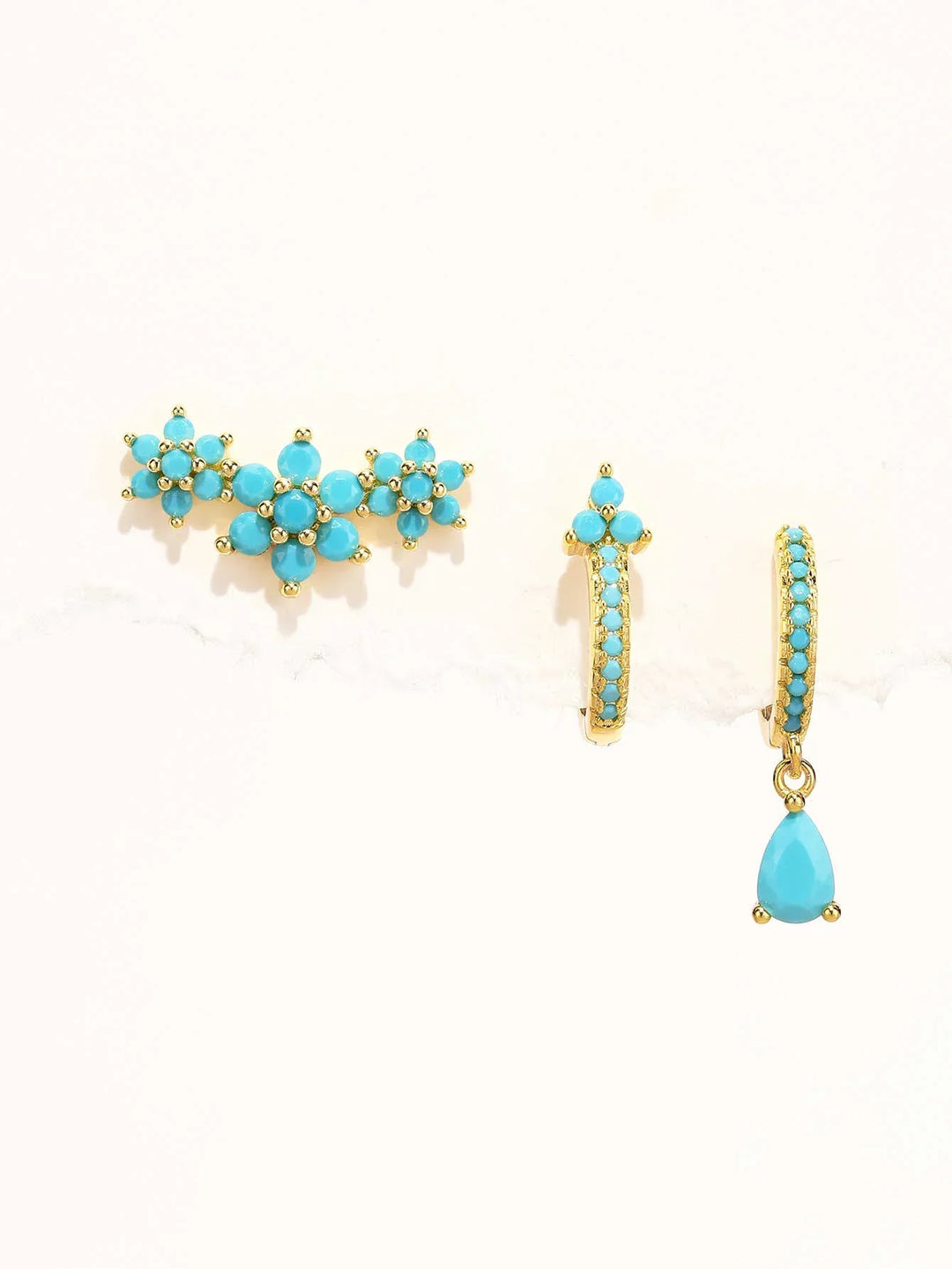 Zlaté náušnice s moderní siluetou Victoria-Anne.