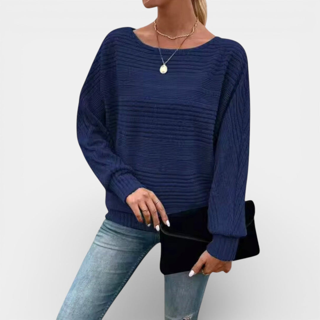 Roksana – Pletené pončo s žebrovanou strukturou