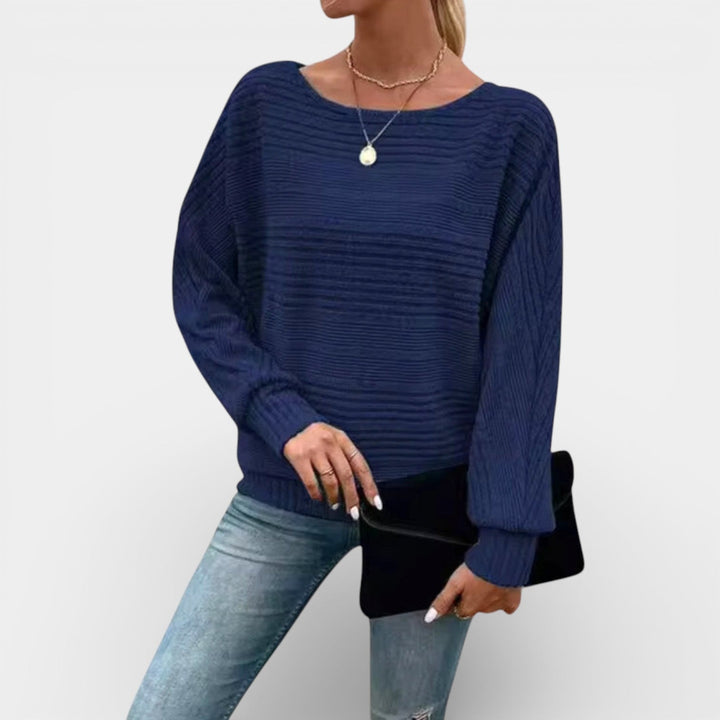 Roksana – Pletené pončo s žebrovanou strukturou