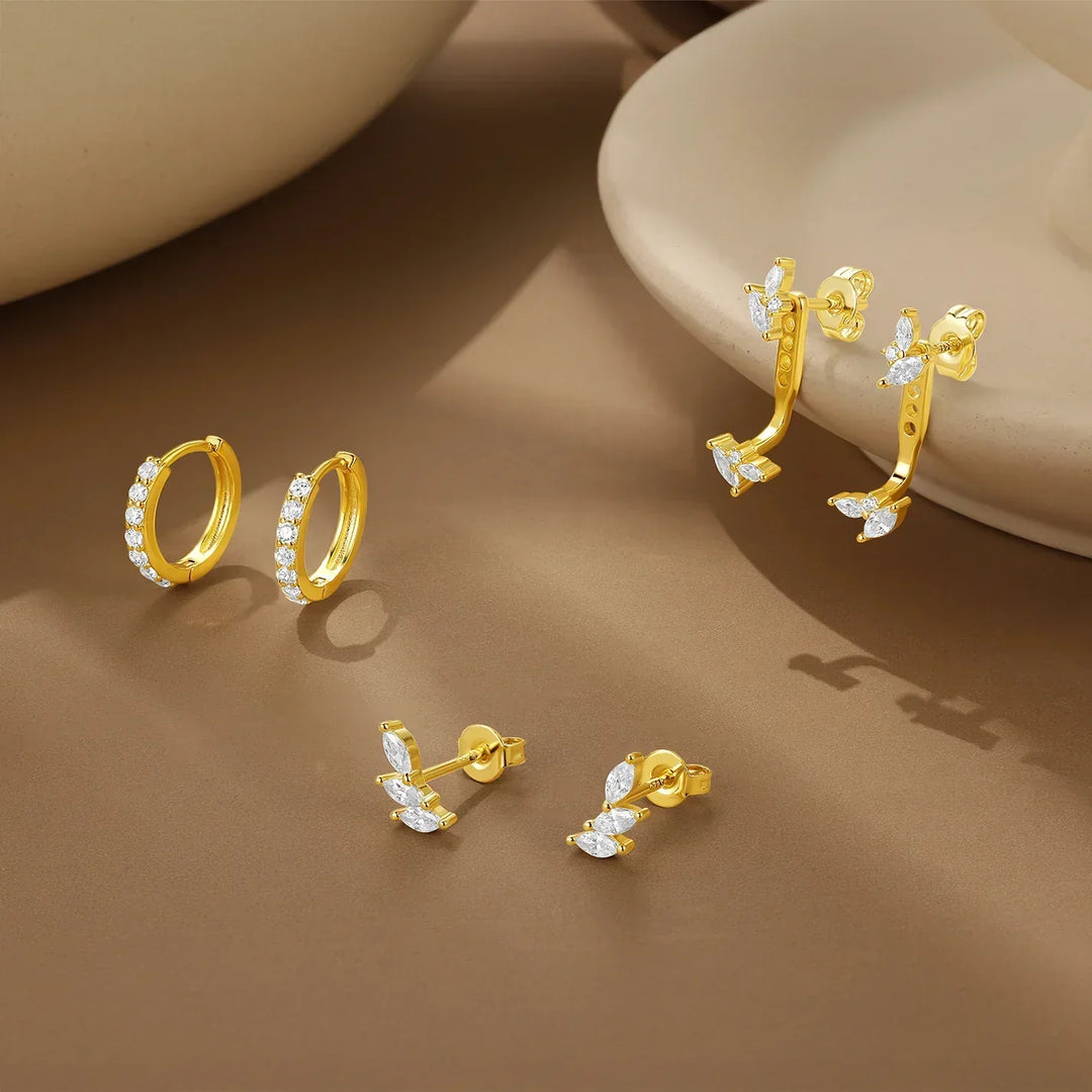 Tereza – Jemné zlaté náušnice s jasnou linií.