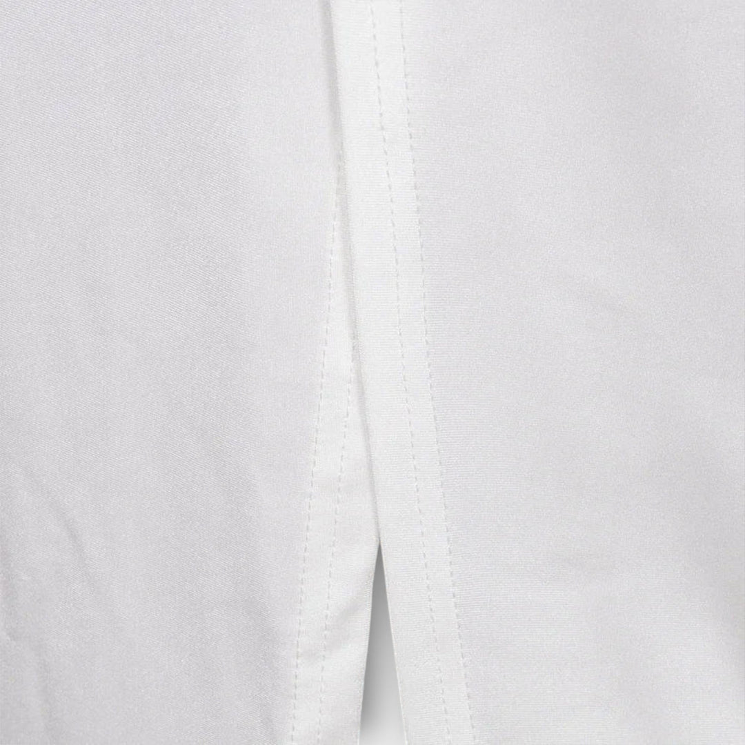 Selah - Bílé šaty s dlouhým rukávem a výřezem v pase s akcenty z kamínků