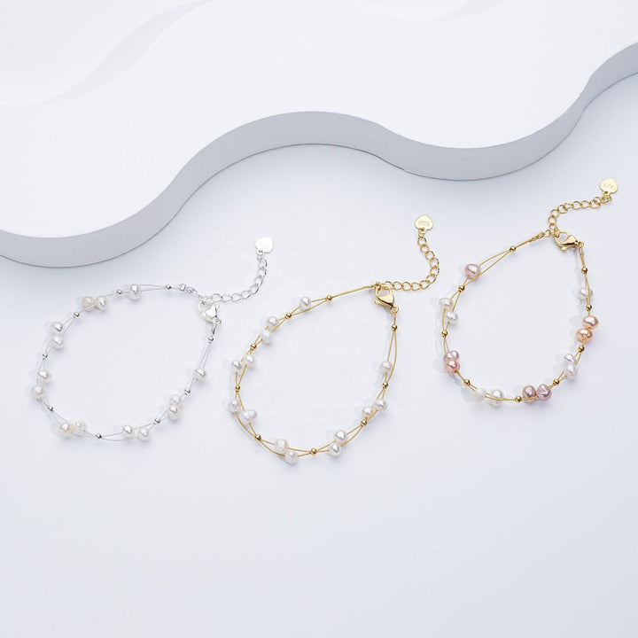 Marlena – Zlatý náramek s perlovými akcenty.