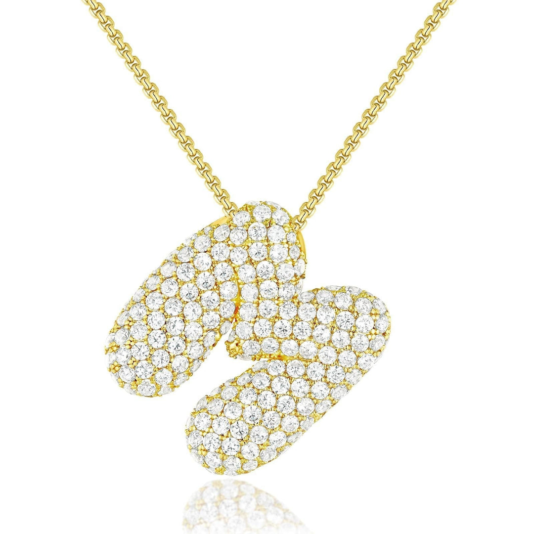 Frieda – Zlatý řetízek s organickým přívěskem.