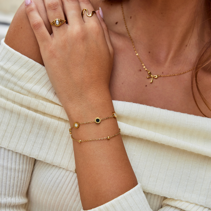 Náramek z onyxu a bílého kamene