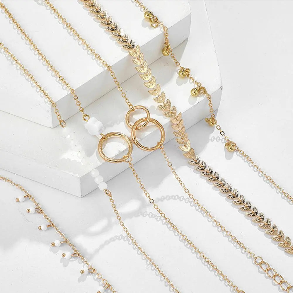 Okouzlující zlatý boho náramkový set