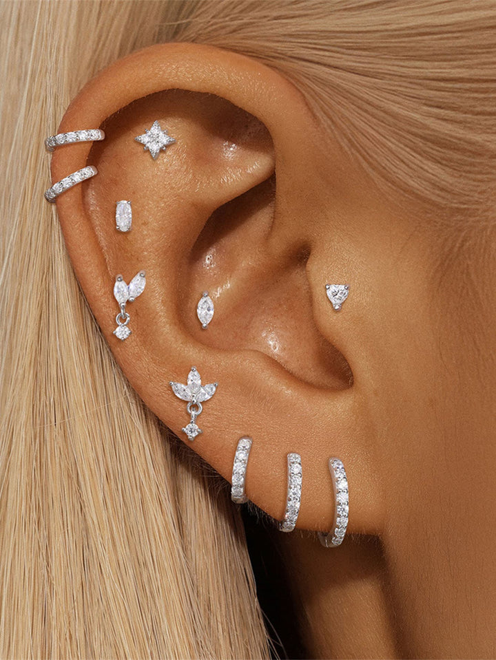 Helena – Zlaté náušnice s organickým designem.