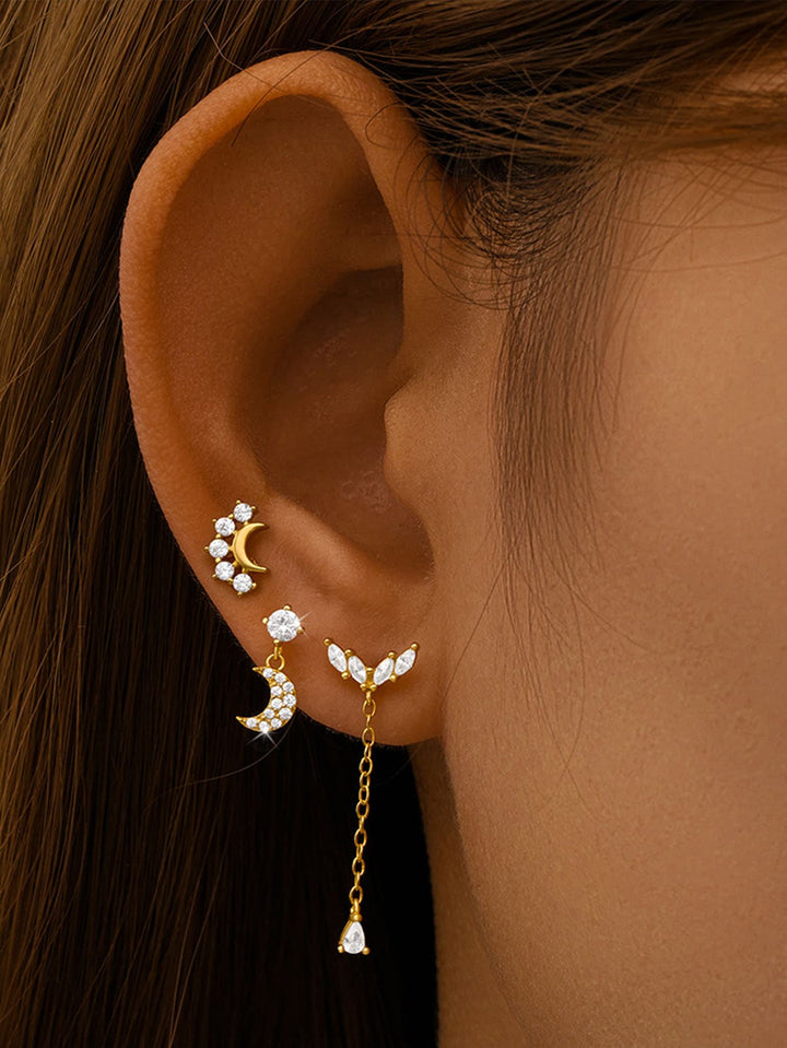 Carla – Zlaté náušnice s jemným zakřivením.