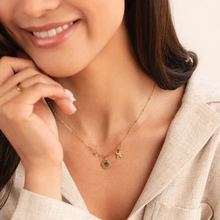 Greta – Řetízek s hvězdným přívěskem ve zlaté barvě.