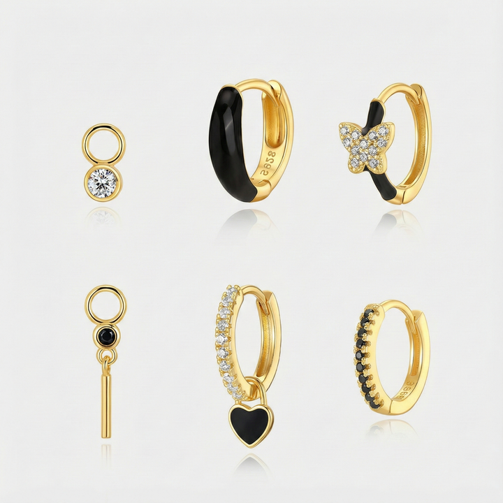 Theresia – Zlaté náušnice s jemným zakřivením.