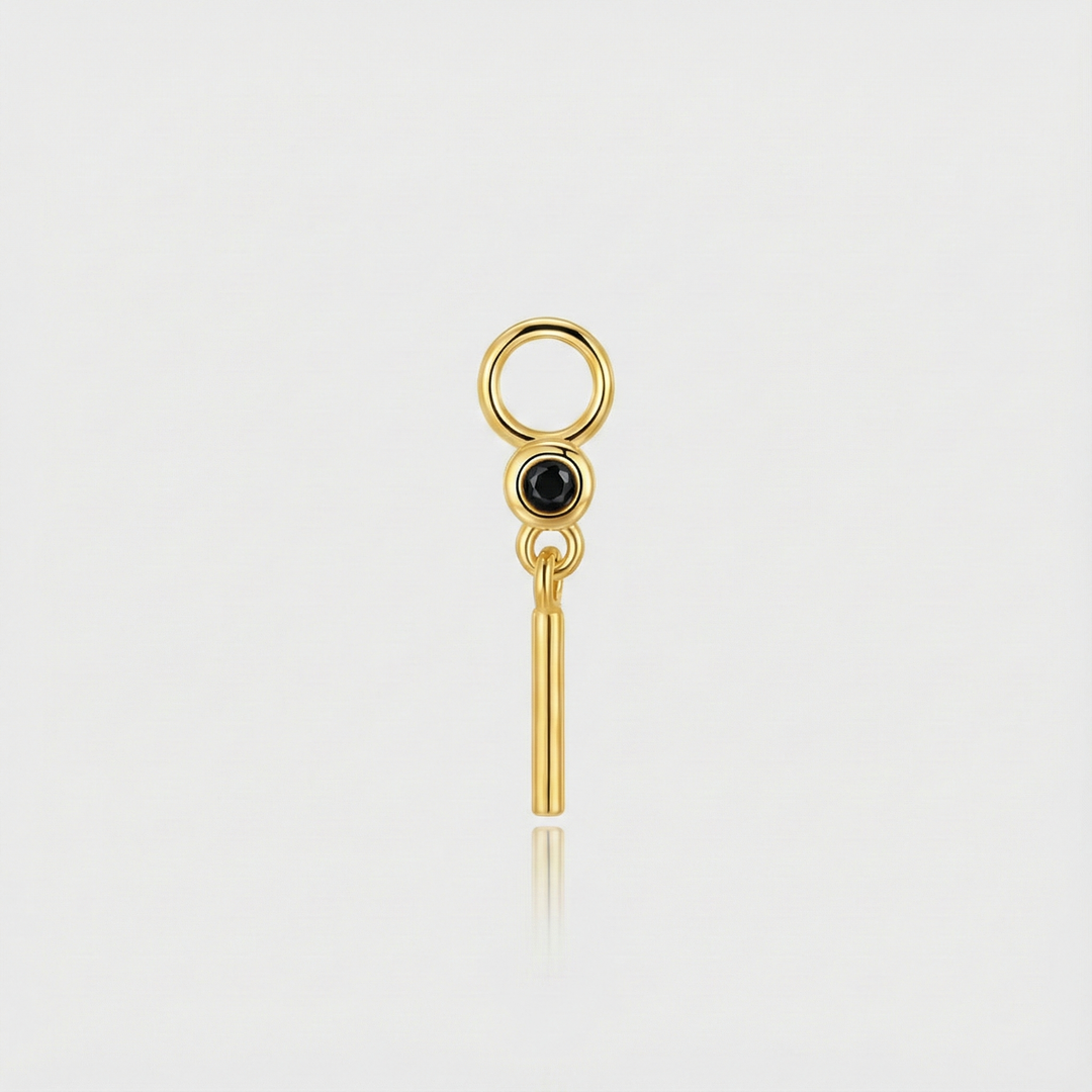 Theresia – Zlaté náušnice s jemným zakřivením.