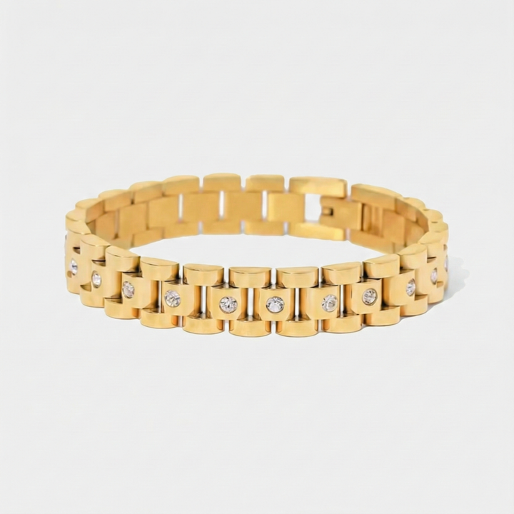 Amira – Zlatý náramek s hrubou článkovou strukturou.